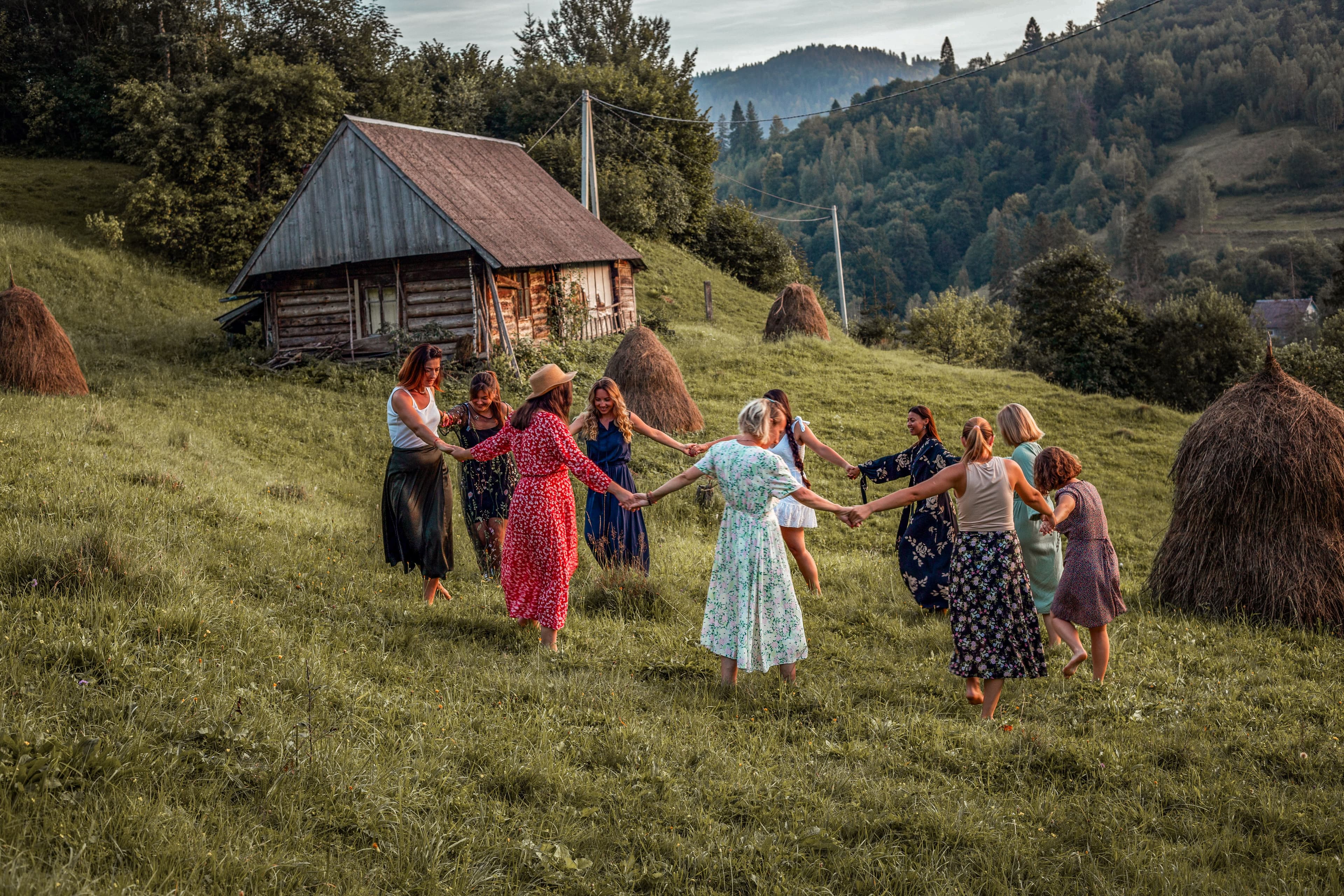 Women gathered in a circle outdoors — La Loba Circle