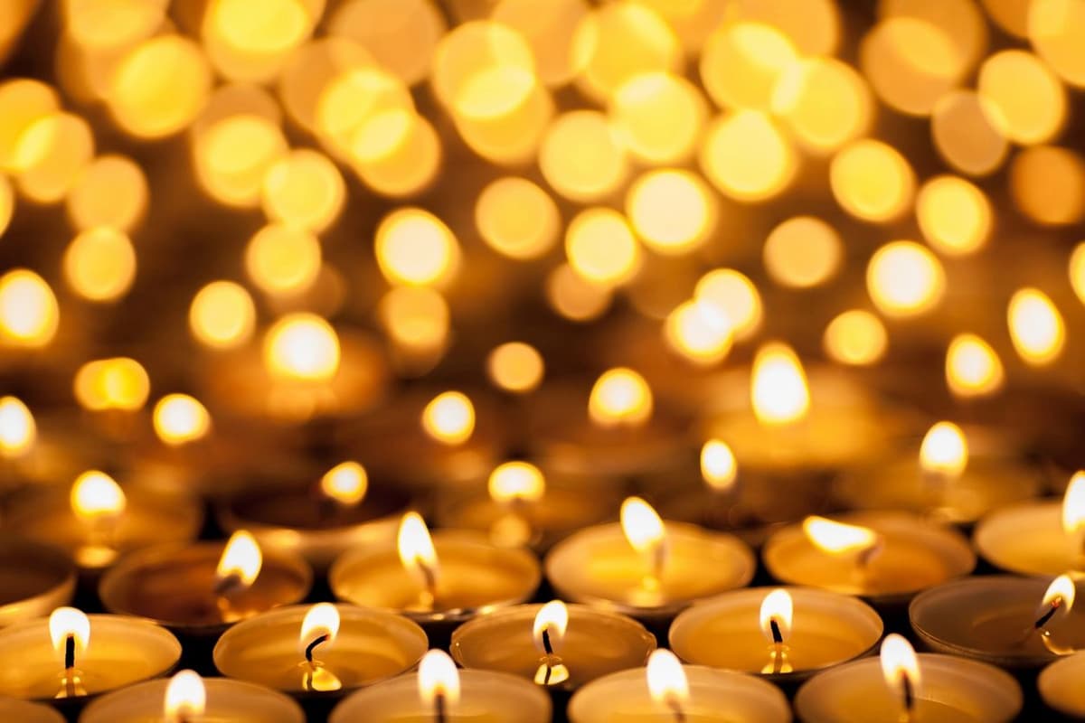 Lit candles symbolising inner peace and ritual